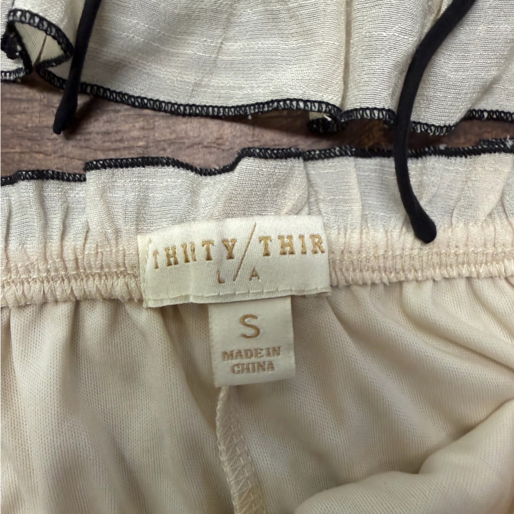 Cream Ruffle Skirt Set with Black Trim - Picture 4 of 13